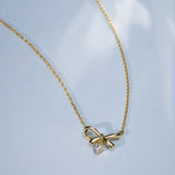 Dancing Diamond Bow Necklace